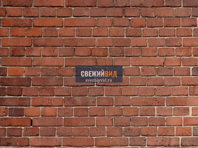 Кирпичная стена после пескоструйной очистки от граффити